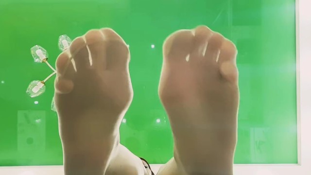 Nika's Nylon Fetish: Dominatrix Teases Sexy Feet