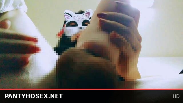 Masked crossdresser indulging in solo pleasure