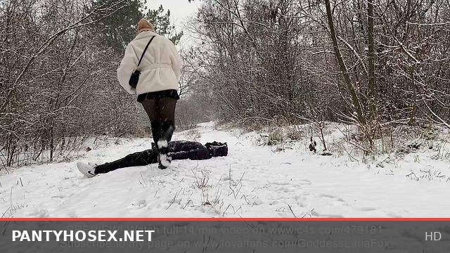 Snowy Outdoor Trampling with Over Knee Boots on Body, Face, and Neck